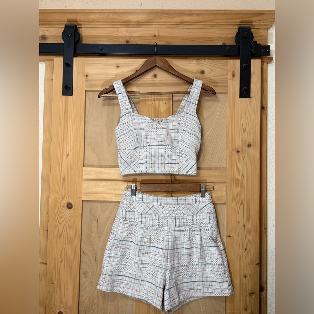 A Collection Ivory Tweed Two-Piece with Blue and Orange Accents